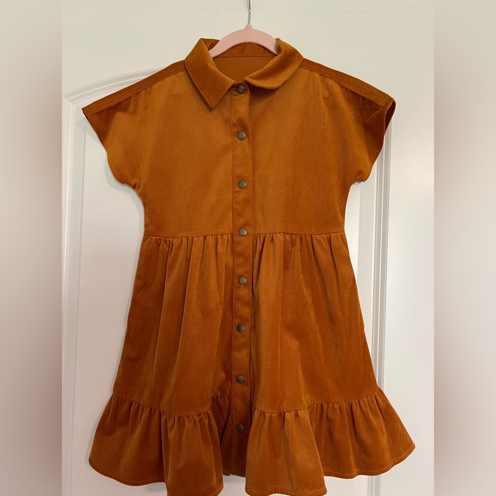 Stylish Orange Kids Dress. Perfect for a Cowgirl with hat and boots.
